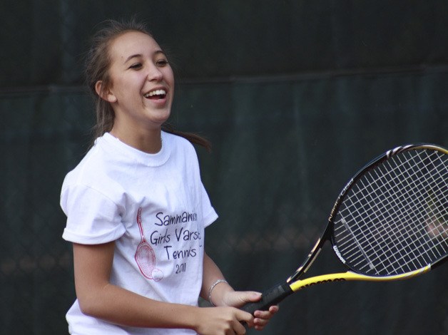 Sammamish senior Malia Lum flashes a smile before a match against Bellevue.