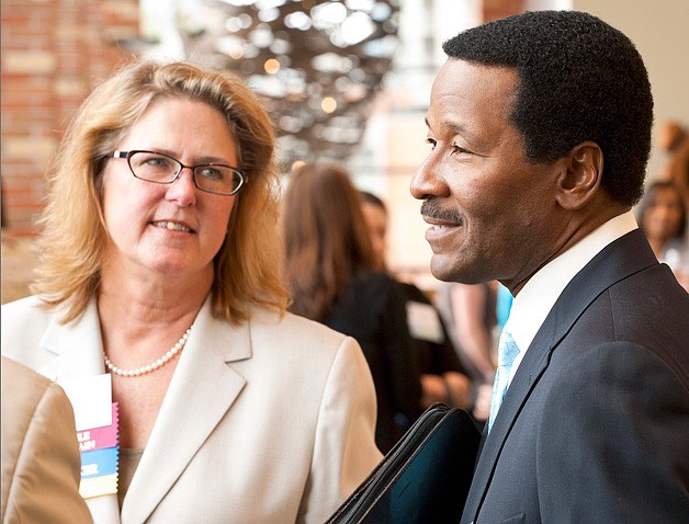 Bellevue Schools Foundation Executive Director Roxanne Kröon Shepherd listens to Spring for Schools luncheon emcee Steve Pool