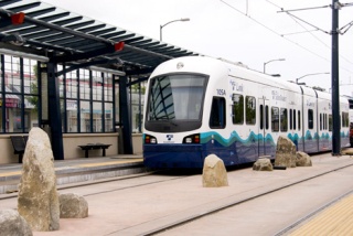 A light-rail train pictured as it might look at a station in Bellevue.