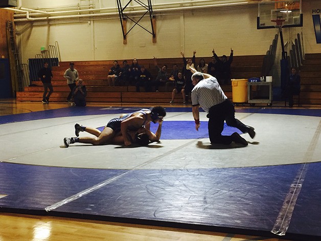 Bellevue Christian 195-pounder Christian Miller pins Interlake’s Jonathan Palagashvili with nine seconds left in the third round.