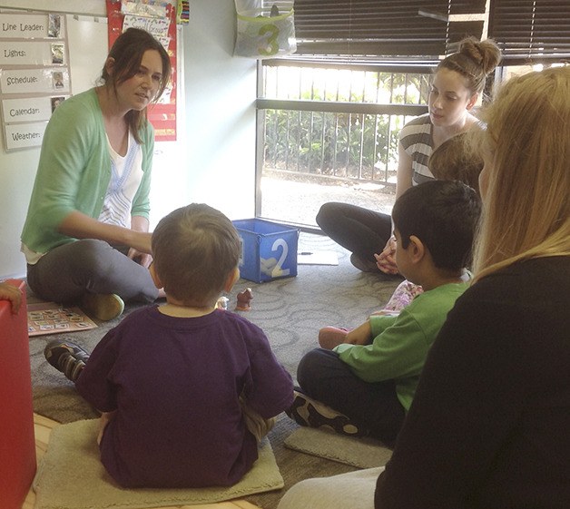 MOSAIC Children’s Therapy Clinic employees  work with a group of clients Tuesday. The clinic resides in a business park identified as part of a potential site for Sound Transit’s Operations and Maintenance Satellite Facility.