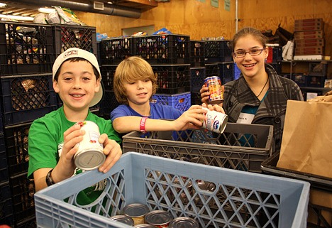 Students at the Jewish Day School in Bellevue celebrated an annual community service day called Mitzvah on Nov. 5. A dozen students volunteered to sort food and do some clean-up work at Hopelink