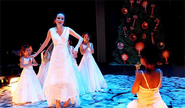 Dancers act out a scene in the Nutcracker Musical