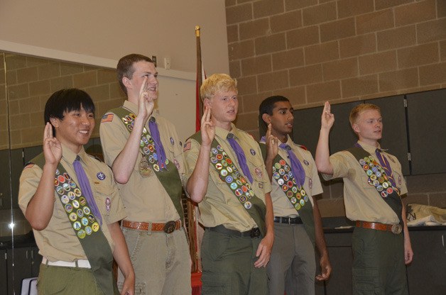 Numerous badges and years after joining the Boy Scouts