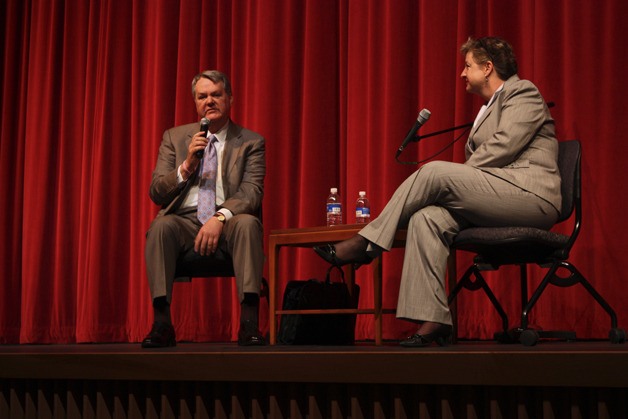 Dr. Mark Mitrovich answers during a community forum held at International School this morning. The session was facilitated by Director of Communications and Community Engagement Jacque Coe.