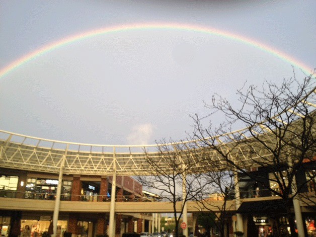 All that rain that has been flooding the area lately produced a pleasant surprise for Doris Fritz of Carnation who photographed this rainbow over Redmond Town Center about 7 p.m. Thursday