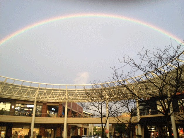 All that rain that has been flooding the area lately produced a pleasant surprise for Doris Fritz of Carnation who photographed this rainbow over Redmond Town Center about 7 p.m. Thursday