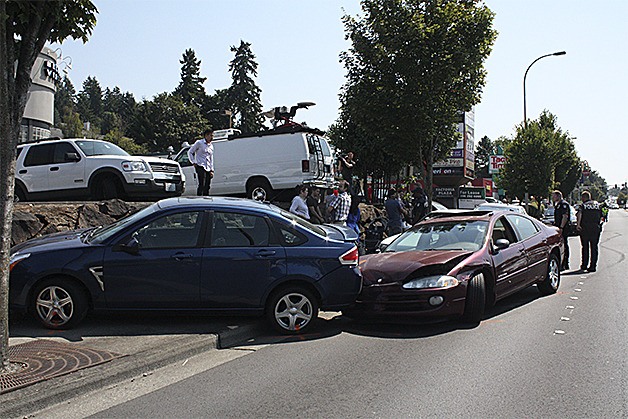 Vehicles at the scene on Factoria Boulevard. The suspect had been driving northbound when he struck seven cars on Thursday afternoon.