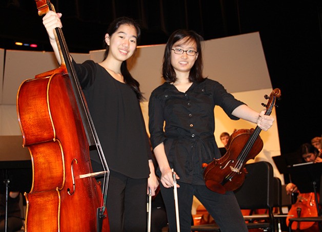 Audrey Chen (left) and Dong Hee Lee are students in Interlake High School's Chamber Orchestra.