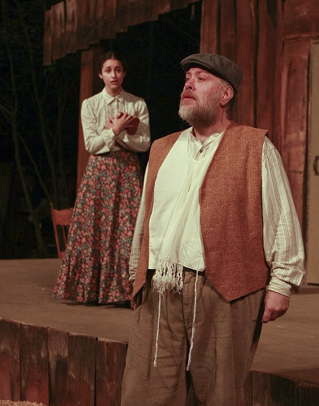 Doug Knoop as Tevye (foreground) and Bianca Raso as Chava in 'Fiddler on the Roof' at Snoqualmie Falls Forest Theater.