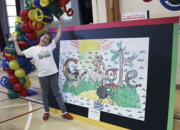 Eva Lindberg stands next to the doodle she submitted to the Doodle for Google contest. She was announced as one of 50 finalists on Wednesday
