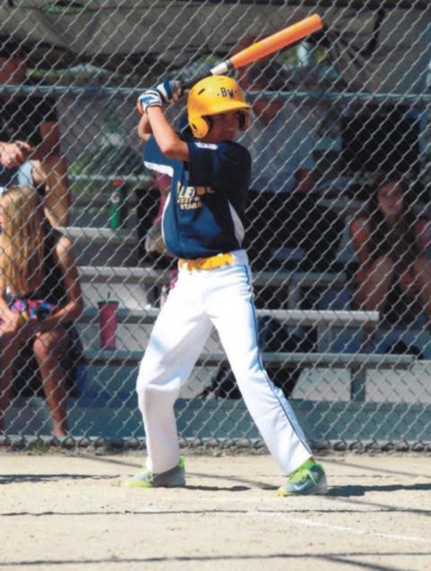 Bellevue West Little League player Alexander Evans gets ready to swing the bat in a game earlier this season. Evans will represent the Northwest in the USSSA baseball All-American Games from August 7 through Aug. 13  in Orlando