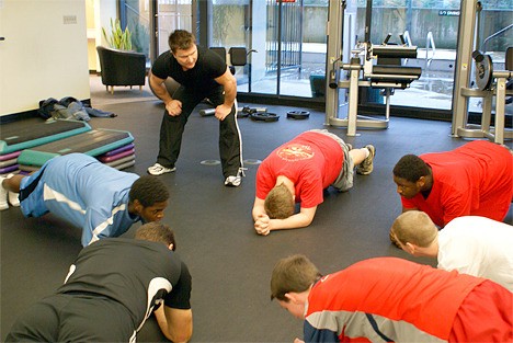 Shawn Casey works with students from the Bellevue Boys and Girls Club at his fitness studio.