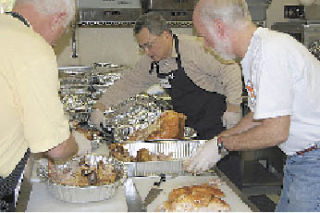 Volunteers at St. Thomas Episcopal Church in Medina catered a Thanksgiving dinner for 600 people last week as a part of a Hopelink effort to take meals to peoples’ homes on the Eastside. Tammy Waddell led the volunteer effort.