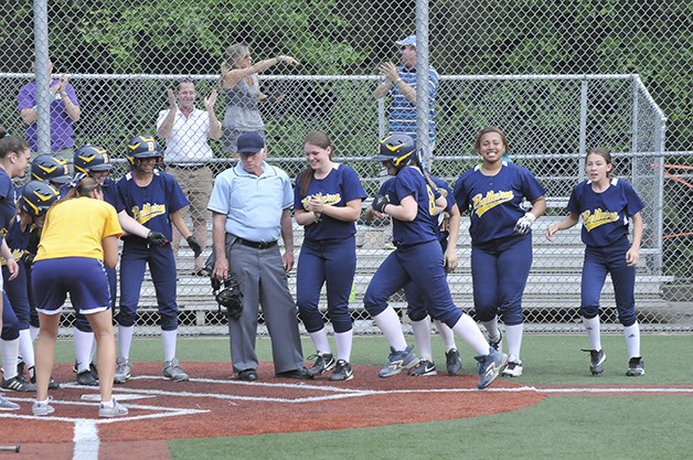 Bellevue players and coaches had plenty to celebrate after Kristie Bennett delivered a walk off home run in the first game at the KingCo tournament