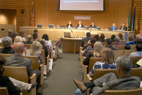 An overflow crowd filled the Bellevue City Council chamber Tuesday night to hear King County's budget committee take comments on the county's proposed budget.