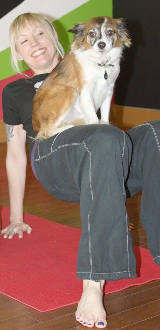 Barking Buddah Doga instructor Brenda Bryan and her sidekick