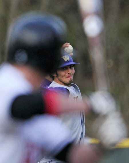Washington starting pitcher Adrian Gomez throws a pitch to a Seattle University batter at Bannerwood Park in Bellevue on Tuesday.