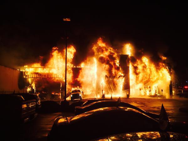 Bellevue firefighters responded to a three-alarm fire at the AutoNation Ford dealership at Northeast Fourth Street and 116th Avenue Northeast Saturday morning. The dealership is being called a total loss.