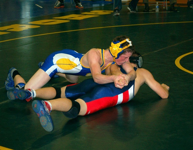 Connor Hudson grapples with Nathan Hale's Jasper Borgette during the 140-pound weight class title bout at the Shoreline Invitational on Saturday. Hudson would pin Borgette for the championship.