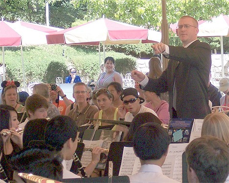 Bellevue High School Band Director Vince Caruso leads the band at a recent performance at Disneyland.