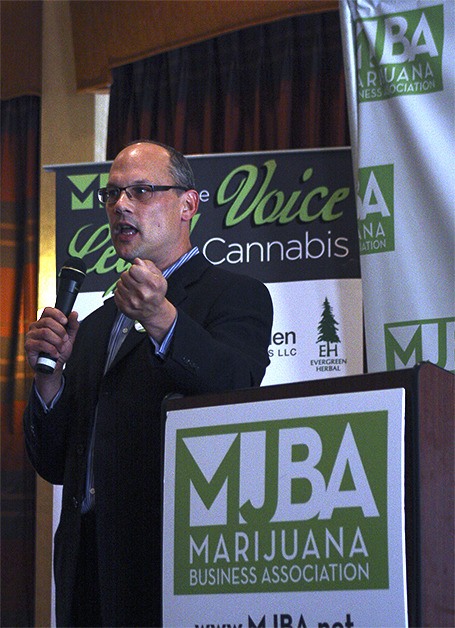 Marijuana Business Association Founder Dave Rheins speaks at Saturday's job fair for the marijuana industry at the Bellevue Red Lion.