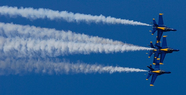 The U.S. Navy Blue Angels take to the air over Lake Washington during a Seafair airshow practice session in this view from Mercer Island on Thursday morning.