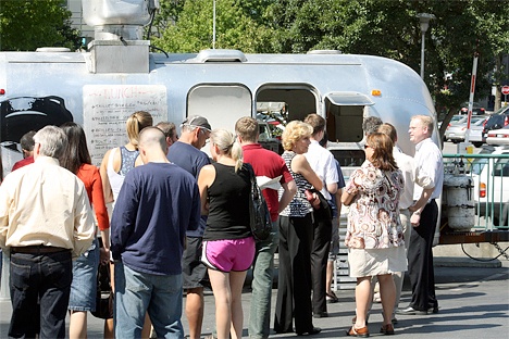 A long line of customers waits to place their order at the Skillet