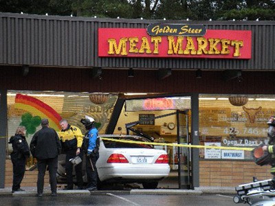 A Lexus sedan crashed through the front window of Golden Steer Meat Market Thursday morning. No one was injured and the shop remains open for business