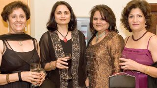 Members of the Indian Community Eastside (ICE) pose at the fifth annual candlelight dinner and bench auction - Sitting Pretty for PACE on Nov. 1. From left: Sita Vashee