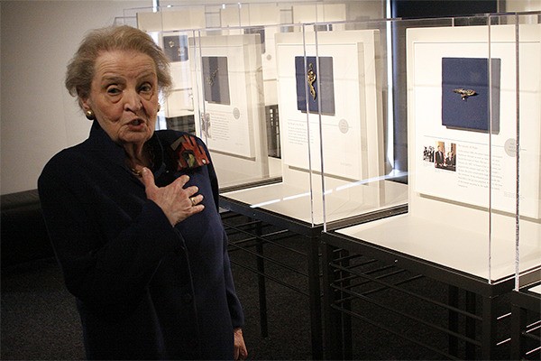 Former Secretary of State Madeleine Albright said wearing pins started out as a response to criticism from Saddam Hussein.