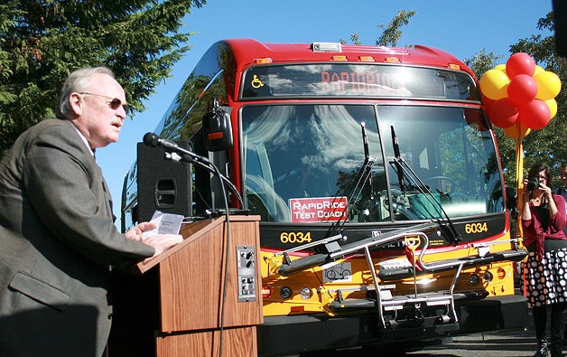 Bellevue Mayor Don Davidson speaks about the upcoming start of RapidRide bus service between Bellevue and Redmond in a ceremony Wednesday in Bellevue’s Crossroads area. The service starts Saturday. BILL CHRISTIANSON