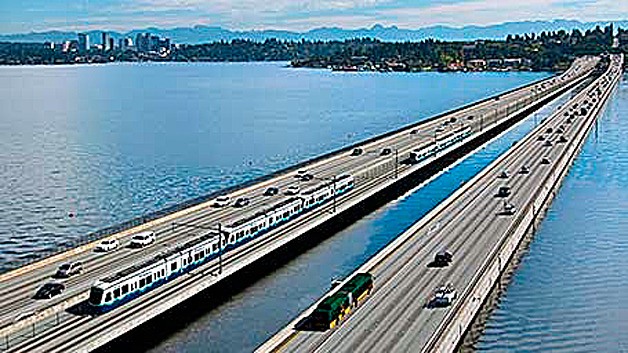 An artist’s rendering shows light rail trains crossing I-90