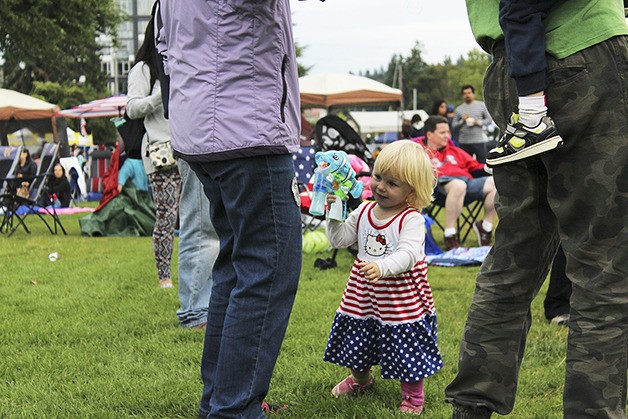 A young girl celebrates the Fourth of July in Bellevue's Downtown Park.
