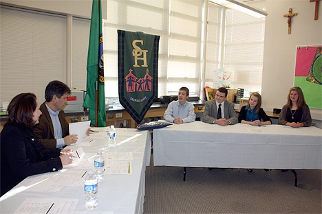 Lisa O'Toole and Bob Dugoni (at table to left) discuss the Constitution with (from left) Jacob Weatley