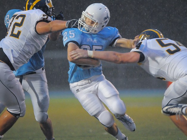 Wolverines DL Marcus Henry (72) was called for a facemask penalty on this play at Interlake on Friday.