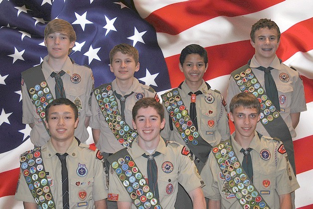 Scouts getting their Eagle rank are (rear row