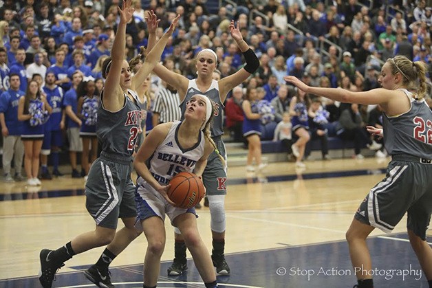 Bellevue Christian junior Sperry McQuaid was surrounded by a bevy of Kings players in a regional playoff game on Feb. 26 at Bellevue College. Kings defeated Bellevue Christian 34-30 in the contest.