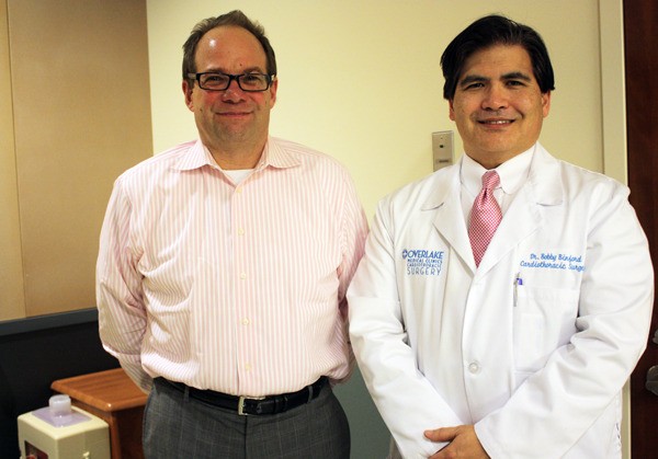 Sammamish resident Mark Phelps (left) underwent minimally invasive cardiac surgery at Overlake in February. He was operated on by Dr. Robert Binford (right).