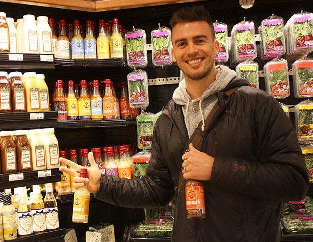 Maryland native Brian Vetter poses with Tessemae All Natural Dressings. The product