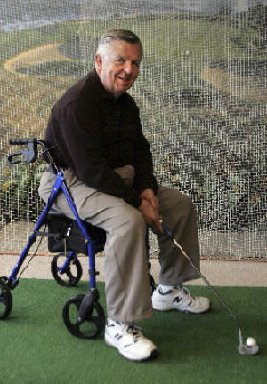 Bill Perry built a special putter that lets people in rolling walkers still enjoy putting.