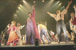 The cast of Corteo waves goodnight to the crowd at the finish of the Cirque Du Soleil dress rehearsal Wednesday night