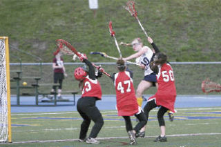 Bellevue’s Merielle Moffatt scores one of her three goals against Snohomish.