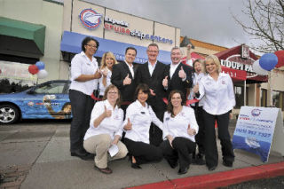 Executives and team members with Expedia CruiseShipCenters held the grand opening of the first-even retail store that combines Expedia and CruiseShipCenters. The launch of the store took place in mid-April at Crossroads Bellevue shopping center. The open house welcomed more than 350 guests. Pictured (back row