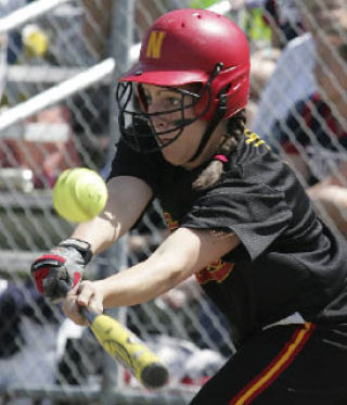 Beka James makes contact during the Knights win over Bishop Blanchet on May 15 at Marymoor Park in Redmond.