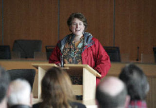 Mary Embleton of Cascade Harvest Coalition speaks to a crowd gathered at Bellevue City Hall on Saturday May 9. King County Councilmember Jane Hague hosted the ‘Living Green’ event.