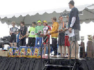 The Neon Knights and their trophies.
