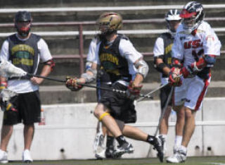 Taylor Platt (17) moves the ball upfield for the Northwest Collegiate All-Stars during and exhibition game against the U.S. National Under-19 team at Mercer Island on Sunday