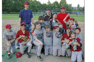 The AAA Bellevue West Diamondbacks with coach Chris Baker (back left) and assistant coaches Steve Carney and Greg Shaw.