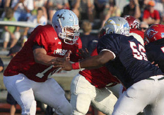 David Slingwine holds down the West line during the All-Star Summer Classic football game July 3 at Central Valley High School in Spokane. Slingwine